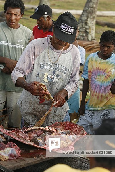 Tasbapauni  Nicaragua  Butcher Cutting Turtle Meat