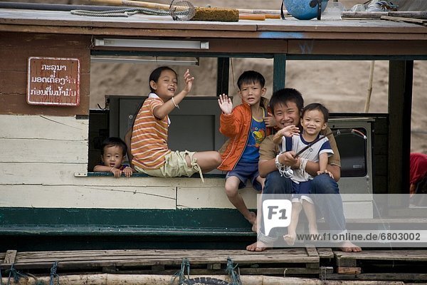 Family Living On A Houseboat  Luang Prabang Laos