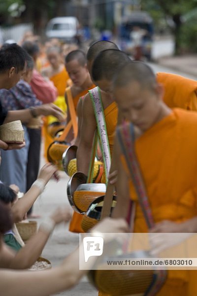 Luang Prabang Laos Buddhist Monks Receiving Offerings