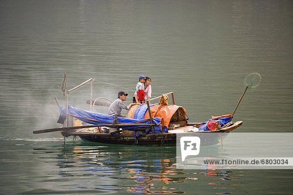 Vietnamese Family Living On Fishing Boat Halong Bay Vietnam  Vietnam