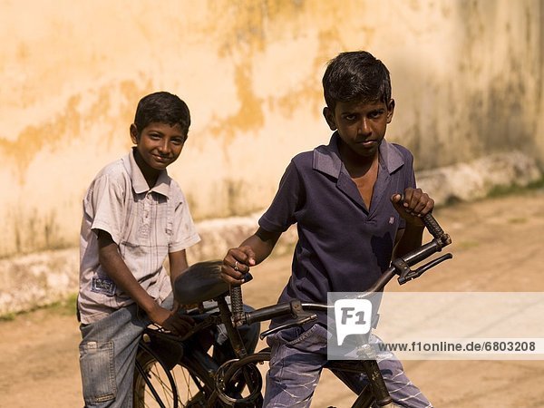Two Boys With A Bicycle  Cochin Kerala India