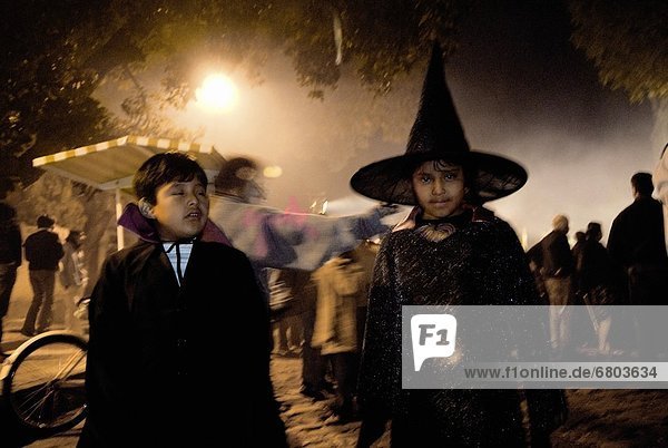 Children Dressed In Costumes For A Mexican Day Of The Dead Celebration  Mexico