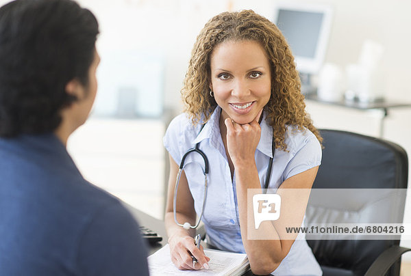 Doctor and patient in clinic