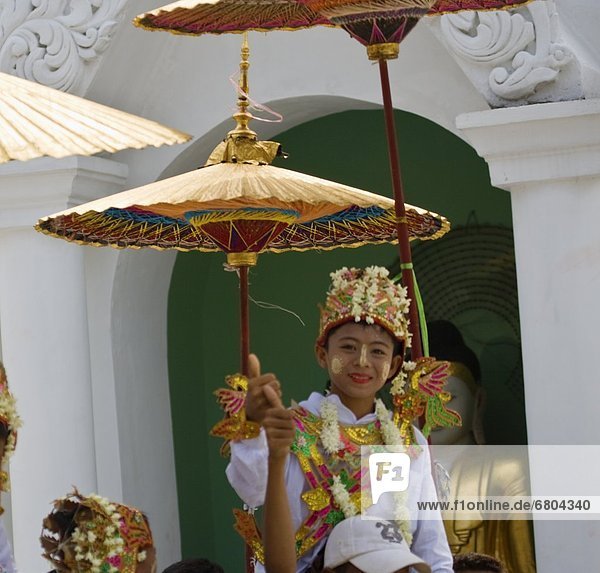 Young Woman Dressed Up For Buddhist Festival