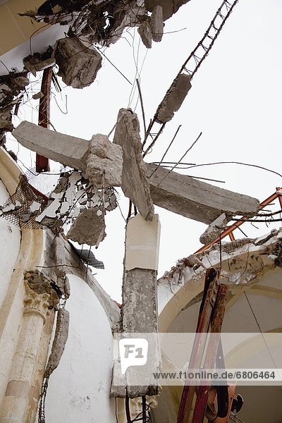 Created From Falling Concrete After The Earthquake  A Cross Is Suspended Between Heaven And Earth  Port-Au-Prince  Haiti