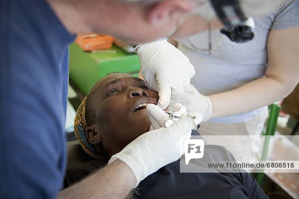 A Dentist Volunteers His Dentistry To Help Haitians In Poverty  Grand Saline  Haiti