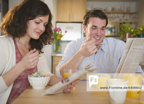 Couple eating breakfast