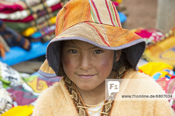 Portrait Of A Girl Wearing A Hat  Sacred Valley Peru