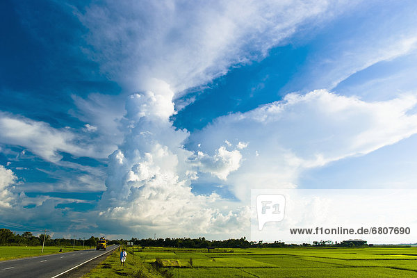 Thunderstorms Billow Over A Highway In A Rural Area  Sylhet Bangladesh