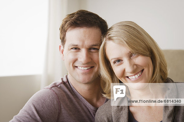 Portrait of smiling mid adult couple