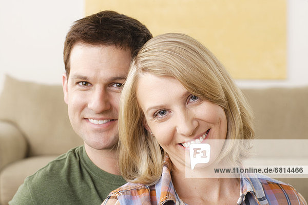 Portrait of smiling mid adult couple