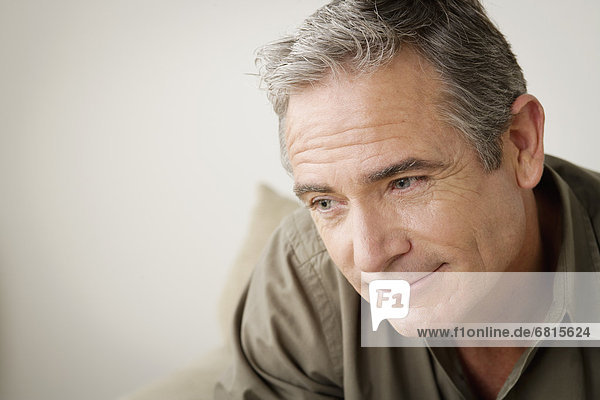 Mature man lost in thoughts
