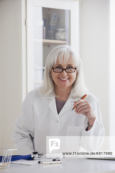 Portrait of senior female doctor