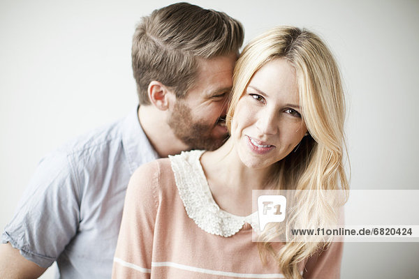 Young happy couple  studio shot