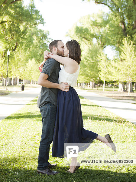 Happy young couple kissing