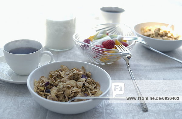 Breakfast with cereal and fruits
