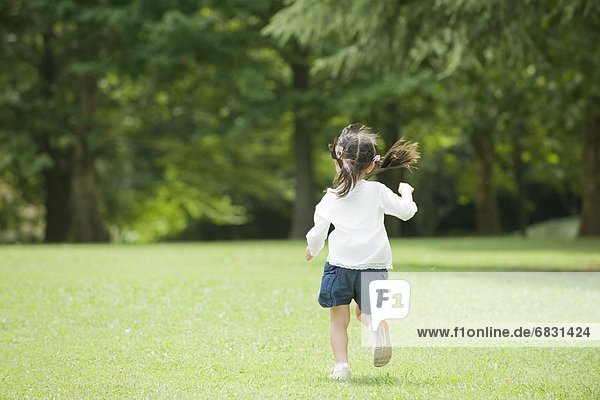 A girl playing in the park