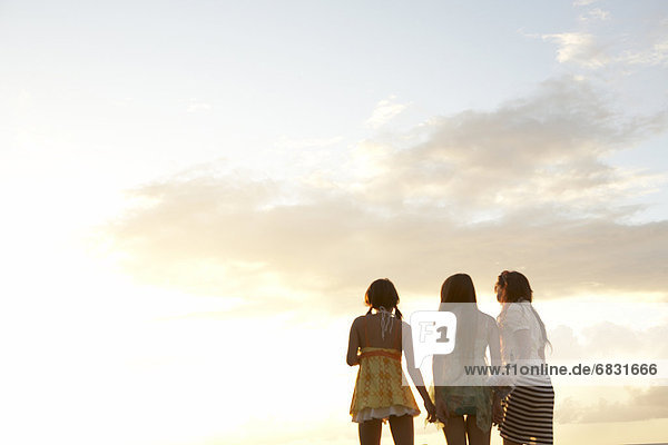 Young women standing side by side  Guam  USA
