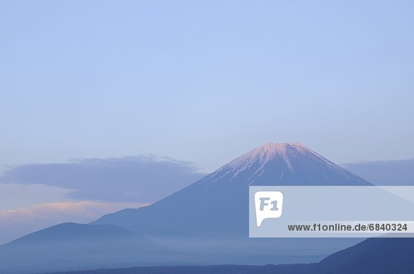 View of Mt. Fuji over Lake Motosu at sunset  Yamanashi Prefecture  Japan