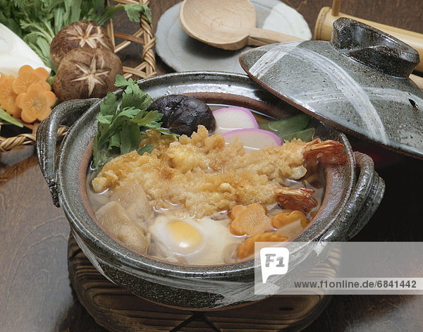Udon noodles and deep fried shrimp cooked in crock pot