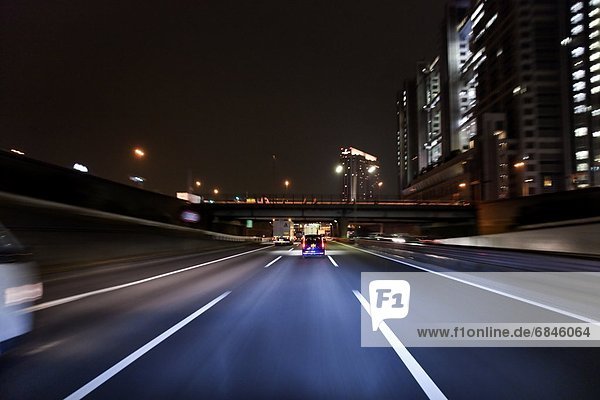Car point of view of a highway road at night. Tokyo Prefecture  Japan
