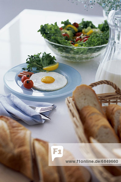 Egg meal with salad and bread