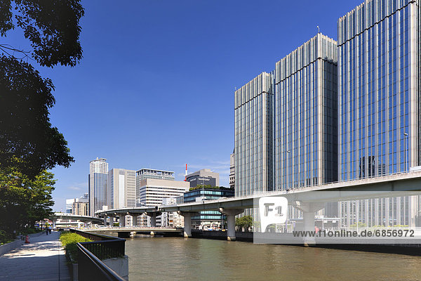 Office buildings  Watanabe bridge and Dojima river  Osaka Prefecture  Honshu  Japan