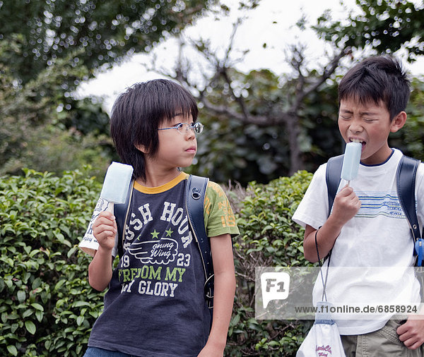 Boys eating popsicles  Japan