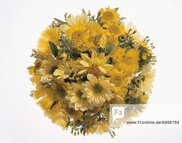 A round bouquet of yellow flowers