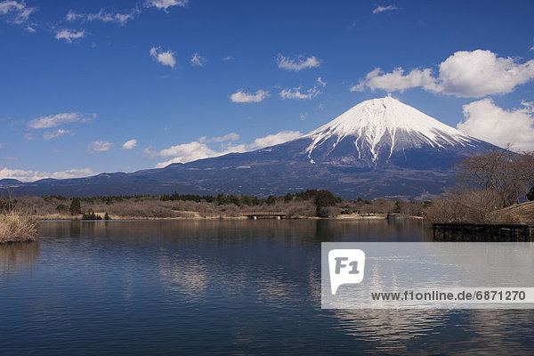 Snowcapped Mt. Fuji and It's Reflection on the Lake