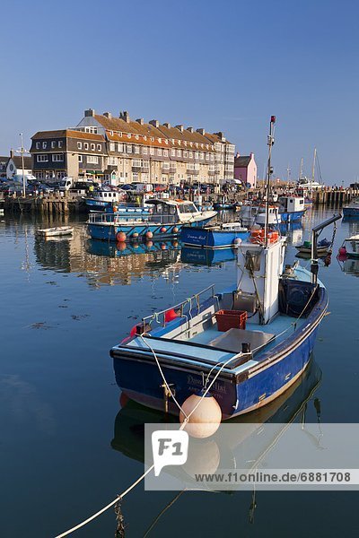 West Bay harbour with yachts and fishing boats  Bridport  gateway town for the Jurassic Coast  UNESCO World Heritage Site  Dorset  England  United Kingdom  Europe