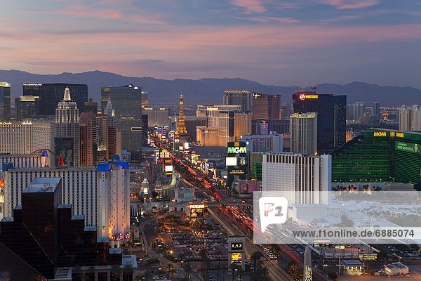 Elevated view of the hotels and casinos along The Strip at dusk  Las Vegas  Nevada  United States of America  North America