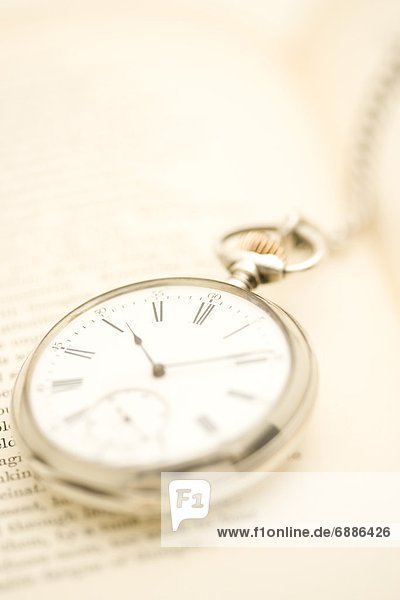 Pocket Watch and Book