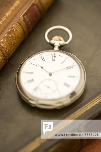Pocket Watch and Book