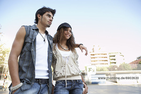 Portrait of Young Man and Woman Outdoors