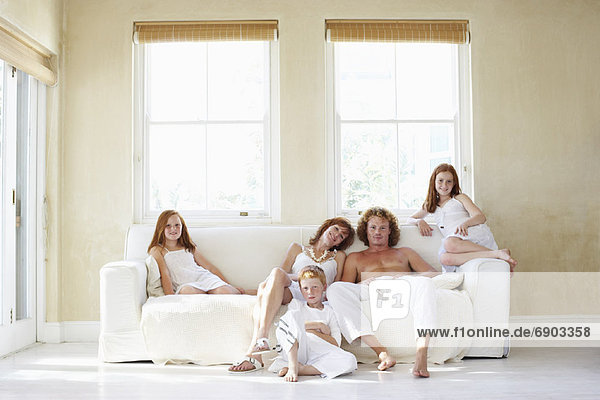 Portrait of Family In Living Room