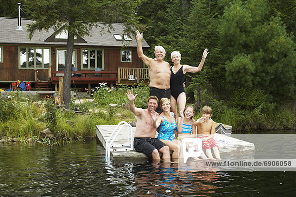 Extended Family on Dock by Cottage