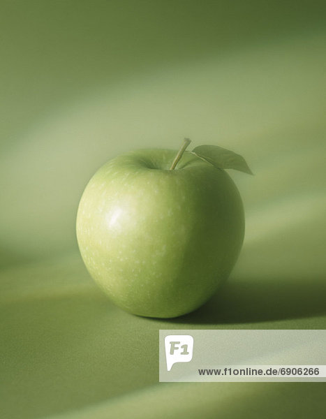 Apfel von oben vor neutralem Hintergrund