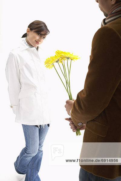 Man Giving Woman Flowers