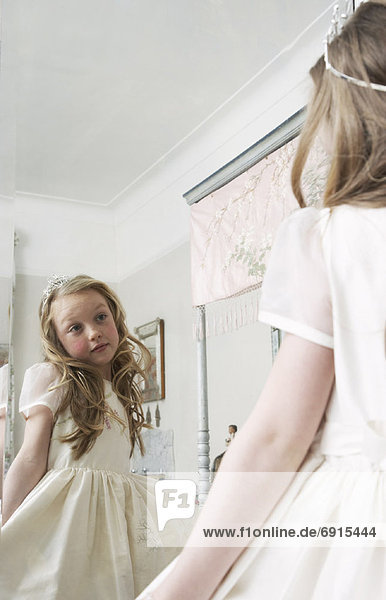 Girl Wearing Dress  Looking In Mirror