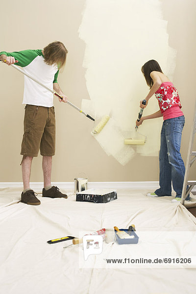 Couple Painting Home