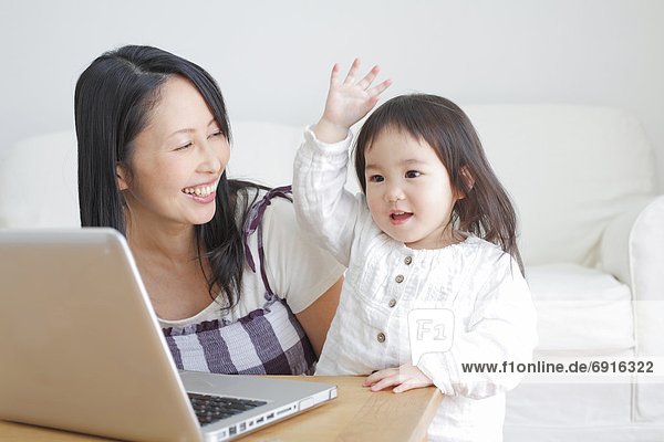 Mother and Daughter with Laptop
