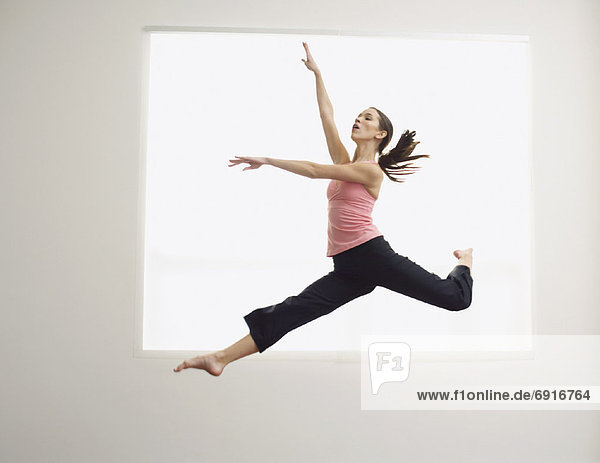 Ballet Dancer Jumping in Air