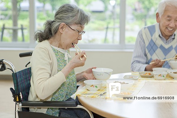 Senior People Eating in Nursing Home