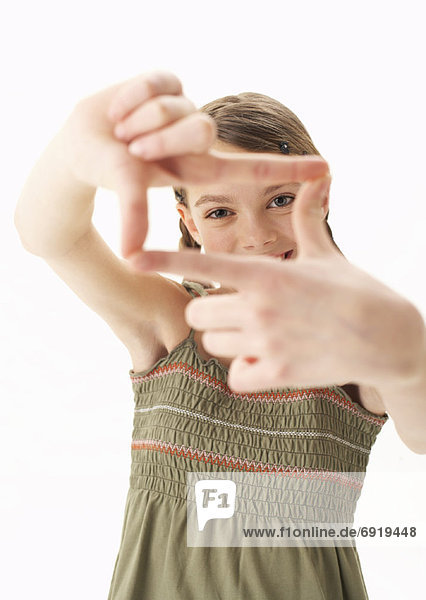 Girl Framing View with Fingers