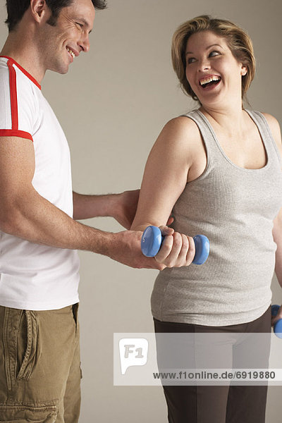 Woman With Personal Trainer