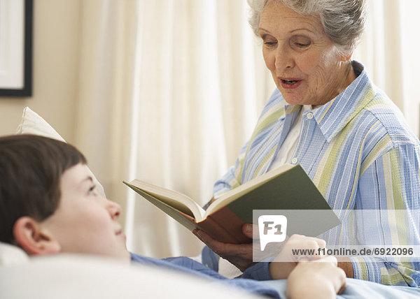Grandmother Reading to Grandson