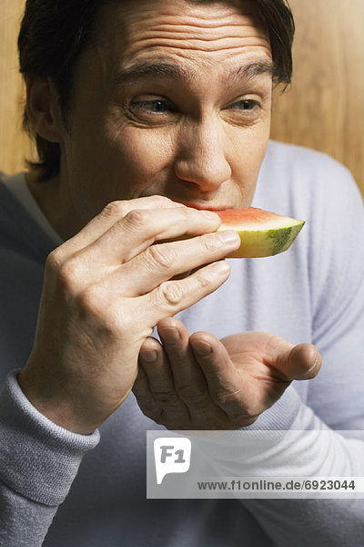 Man Eating Watermelon