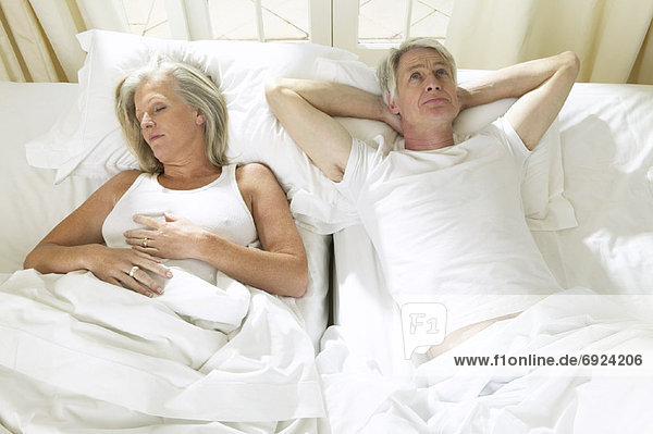 Mature Couple In Bed