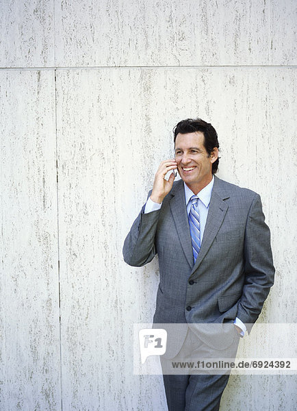 Businessman Using Cellular Phone